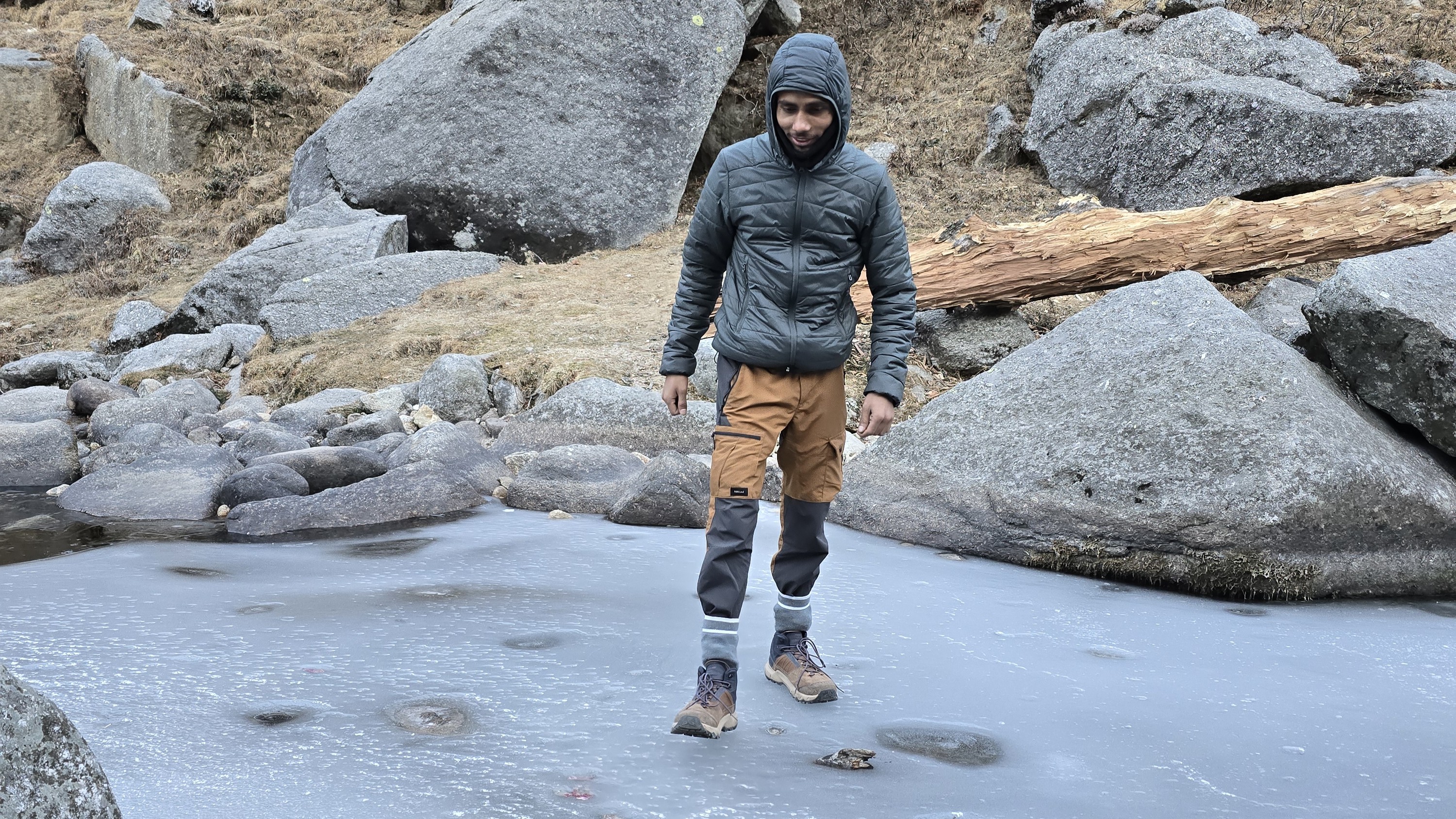 Walking on the frozen water stream in the morning